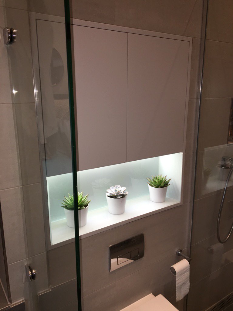 Collfin's tweet image. Campden Hill Gardens - Really effective LED Lighting and BackPainted Glass to recessed shelf in Shower Room