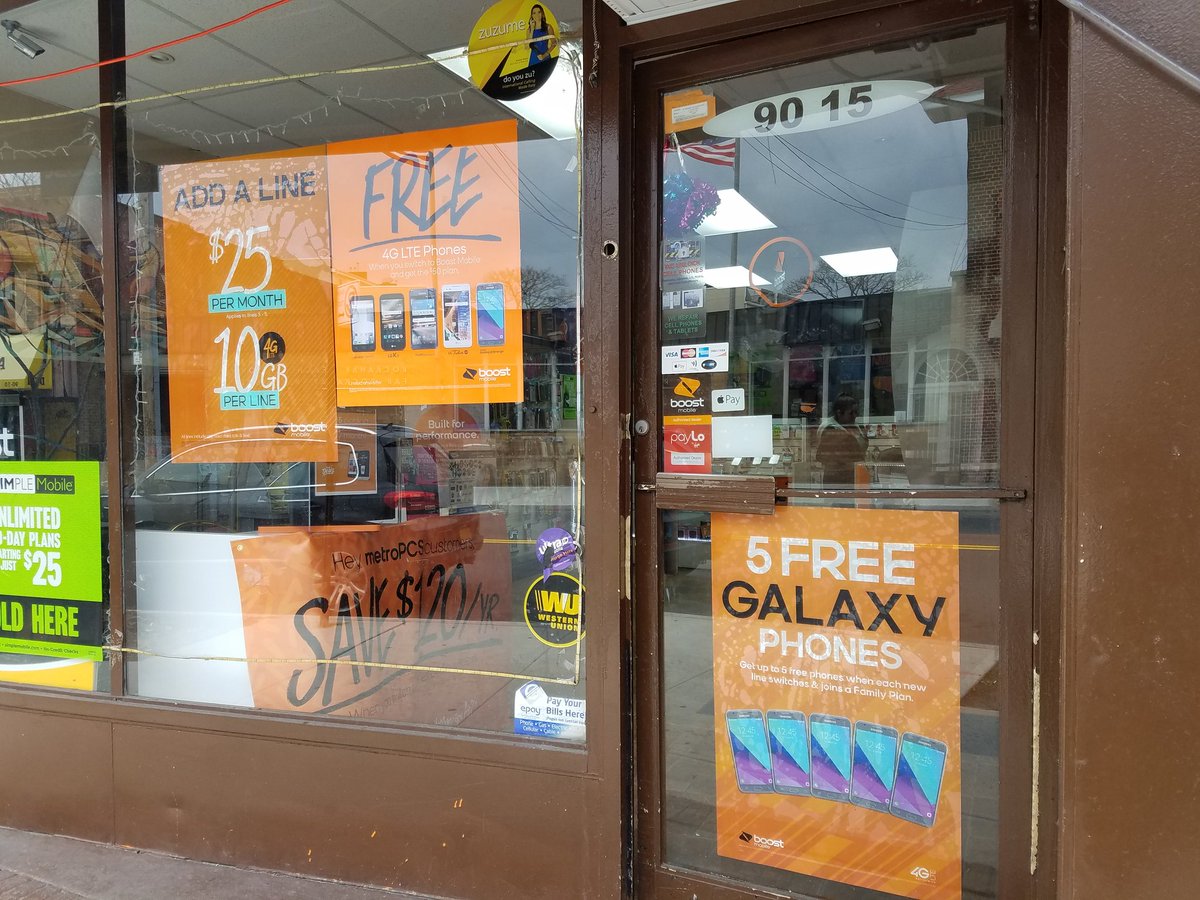 MetroMike11's tweet image. Getting all the new promotions up, in the window, at J&amp;amp;J Wireless, in Rockaway Beach, Queens. #KingsofQueens