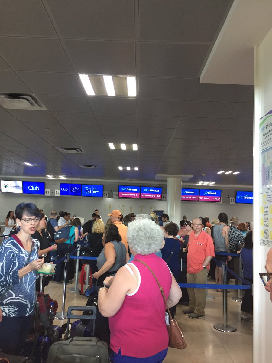 AinsFerg's tweet photo. Good one Air Transat. Now let's work on your system working #checkintakes3hours https://t.co/YlItgTXsc5