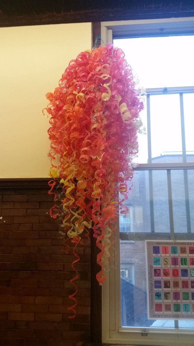 Dale Chuhuly inspired chandeliers made by both 4th grade classes finally hung.