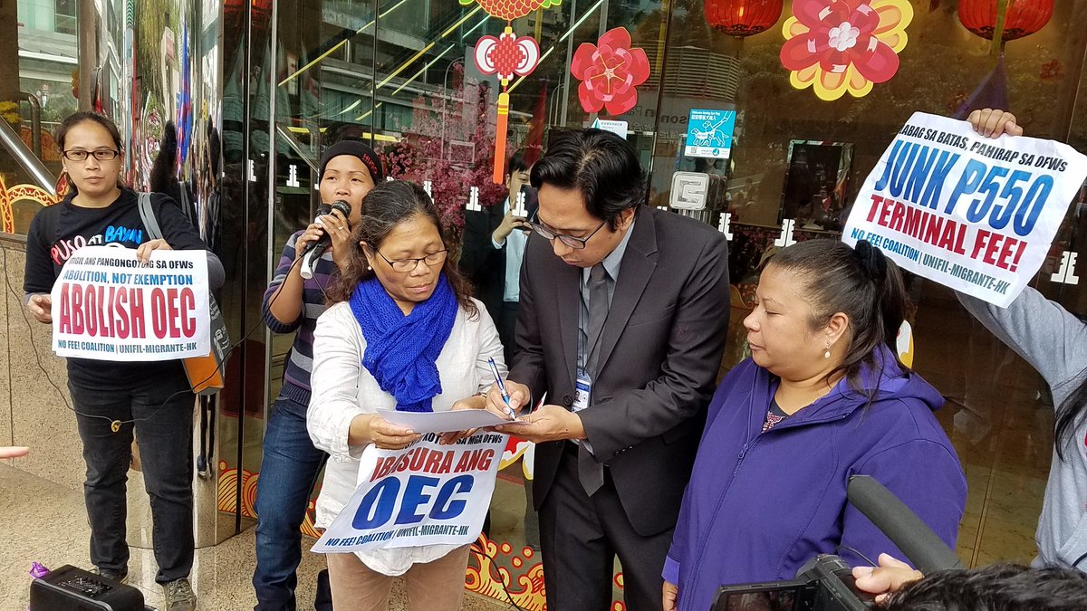MigranteHK's tweet photo. HK OFWs press demand to the Duterte govt to abolish OEC and illegal terminal fee charged to OFWs' airfare #AbolishOEC #JunkP550TerminalFee https://t.co/v5zRQi0RM3