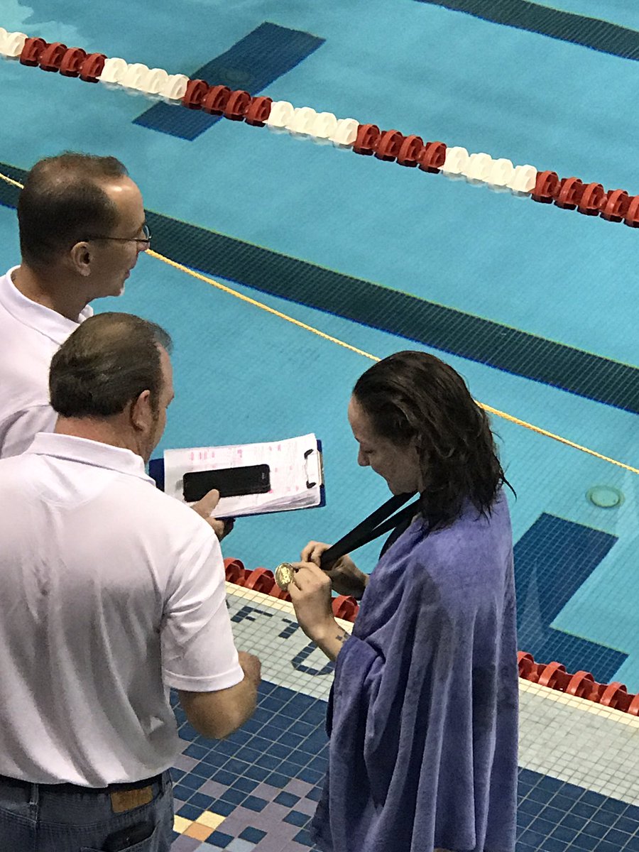 MomHeatherly's tweet photo. Panthers very own Kara benbow sharing her hard earned hardware with coaches... 1st place and swim champ 200IM @LM_Swimming @Panther_Tales https://t.co/jMr8z18Qhl