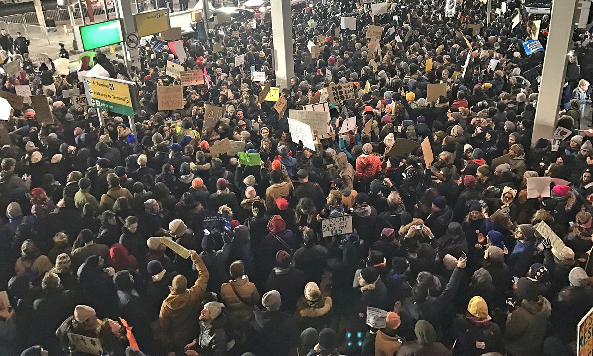 RJSzczerba's tweet photo. RT if you think protesters at #JFK outnumber attendees at Trump's Inauguration.  #MuslimBan #noban #Terminal4 #MuslimBanprotest https://t.co/FmrbttzOfC
