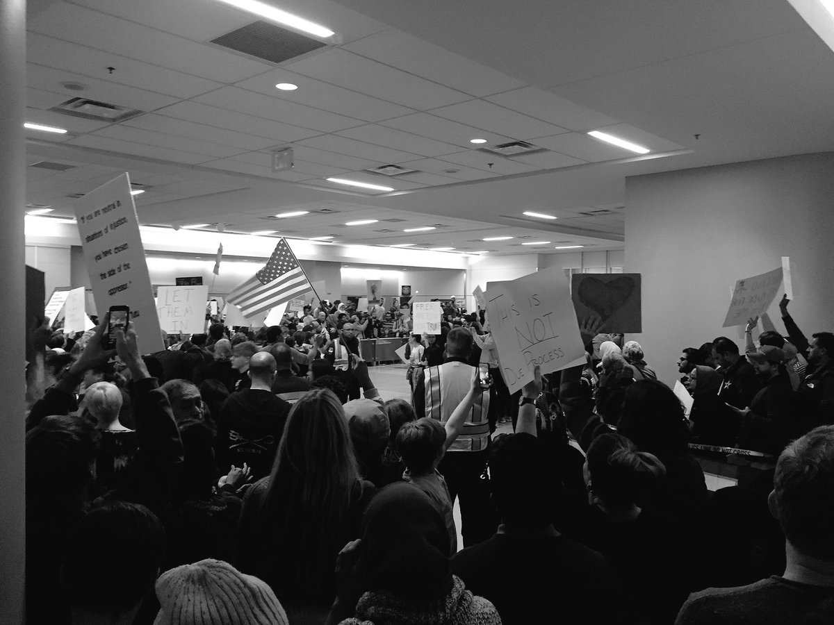"If you are neutral in times of injustice, you have chosen the side of the oppressor" - Desmond Tutu 
#MuslimBan #DfwAirport