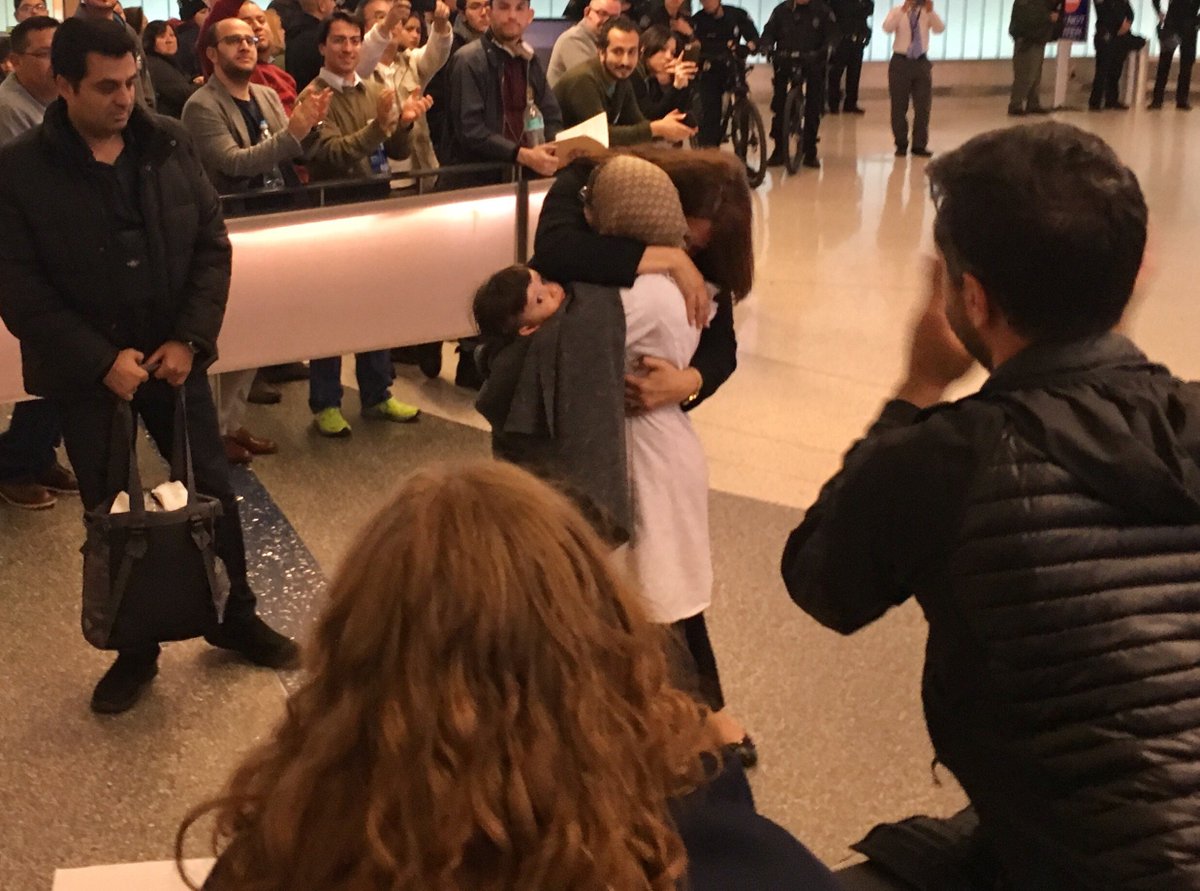 PetulantBeard's tweet photo. A family reunited! #LAXprotest https://t.co/KDNQ3tjnJs