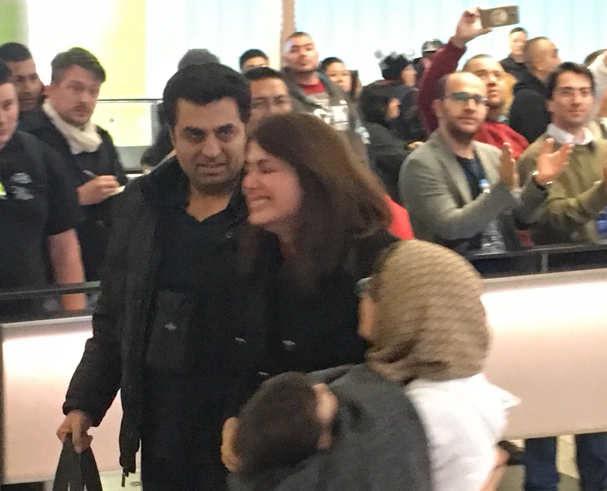 PetulantBeard's tweet photo. A family reunited! #LAXprotest https://t.co/KDNQ3tjnJs