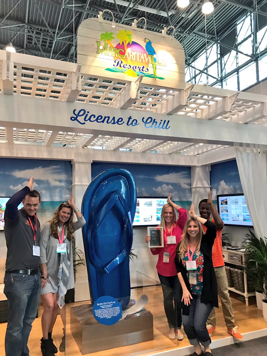 EngageHMS's tweet photo. Fins up for our friends at @Margaritaville for being named the "Best New Exhibitor" at the The @nytimes Travel show! #HMSdelivers https://t.co/cgbxaB1llQ