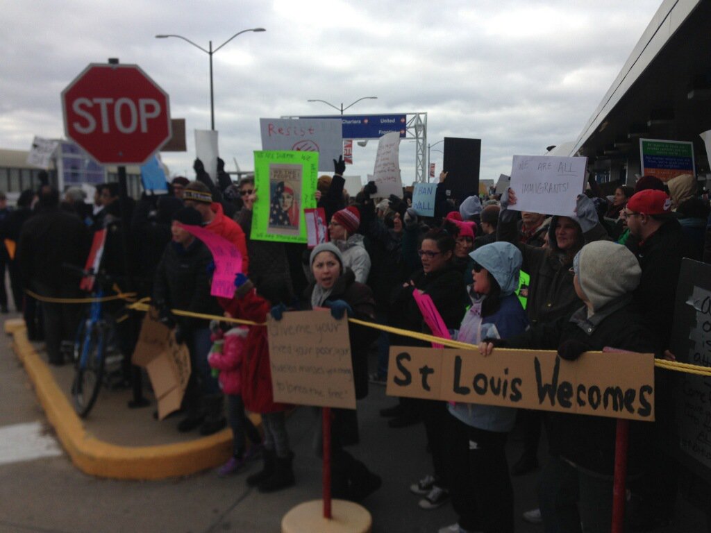 RFTimes's tweet photo. Hundreds have gathered at @flystl to protest Donald Trump's immigration crackdown. Video at https://t.co/YtbeMwdQ9F https://t.co/L0HAmdnMr5