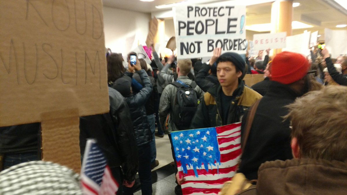 ProjectSouth's tweet photo. Still strong at ATL airport. No hate No fear. Refugees are welcome here. #NoBanNoWall #SouthernPeoplesPower https://t.co/jNPjEuUGX6