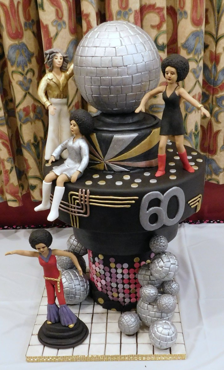 BarbsCakes's tweet photo. #disco #70s #saturdaynightfever #discoball 60th birthday cake with figures modelled on client https://t.co/oFouAhWwYQ
