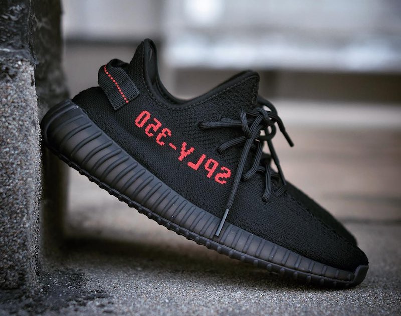 yeezy black with red writing