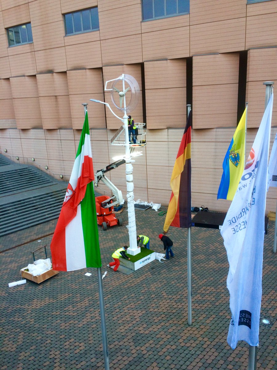 Airsynergy's tweet photo. Airsynergy's #RPU - a hybrid #wind and #solar powered streetlight - is in place outside @EworldEssen ahead of tomorrow's exhibition! https://t.co/KBW9n8CUKv