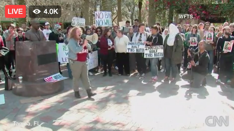 CNN's tweet photo. We’re in Tampa, Florida, where demonstrators are protesting Pres. Trump’s executive order on travel and immigration https://t.co/Rp2XuandV8 https://t.co/HIFNUWVfHO