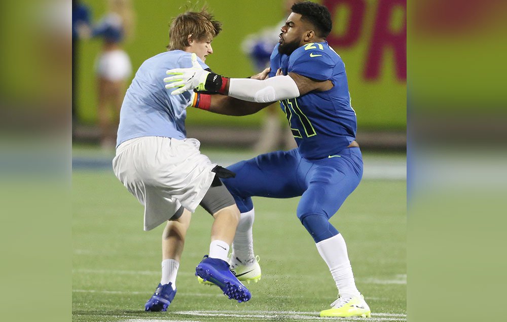 RockBarbers's tweet photo. Watch Ezekiel Elliott tackle a fan to the ground at the Pro Bowl: https://t.co/5wDwL7pyfL https://t.co/5YyfbxHqp8 [via @MensHealthMag]