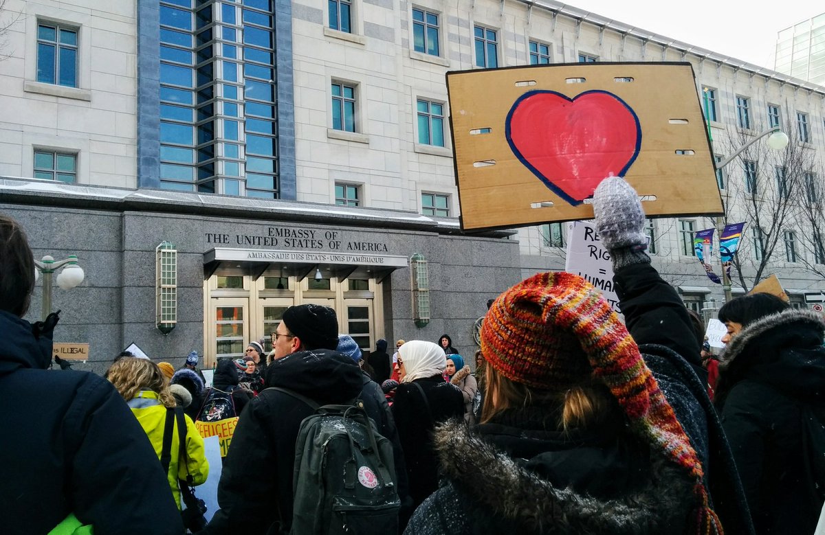 RefugeesOtt's tweet photo. Crowd at US Embassy is chanting "No Ban, No Wall, One Love for All" #NoBanOtt #NoBanNoWall #ottcity #Ottawa https://t.co/sQwrkPcVSC