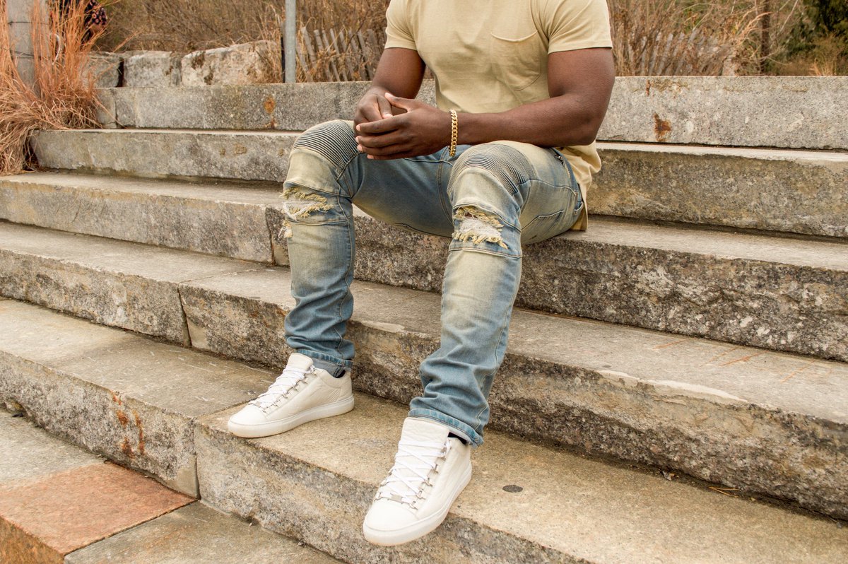 light blue ripped biker jeans