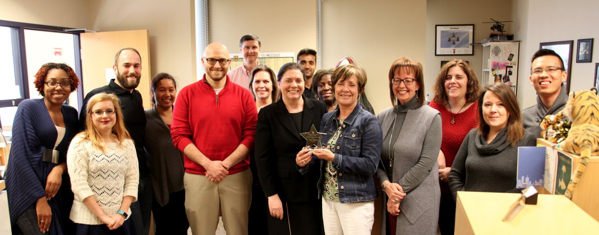 Tina Windett, Director of the Office of Field Experiences, was surprised with the December Rose Porter Professional Staff Award on Friday.