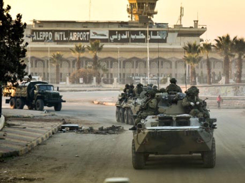 carlbildt's tweet photo. Russian military forces helping to keep control over Aleppo. Here at the airport. https://t.co/mqCvJ6E8fc