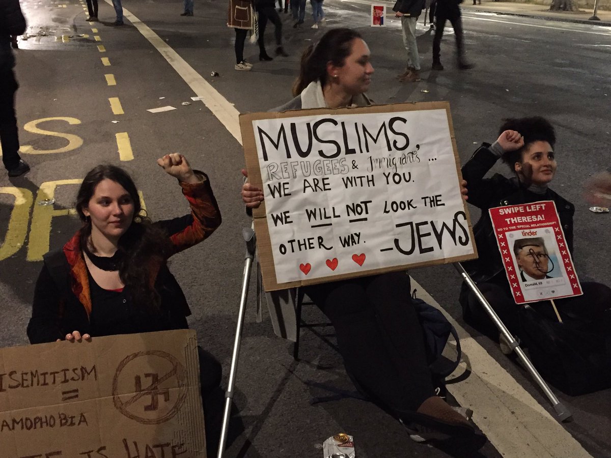 AntiRacismDay's tweet photo. Still #MuslimBan protest at Downing Street #dumptrump #StandUpToTrump https://t.co/6pXvhkkKno