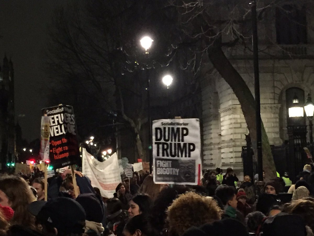 AntiRacismDay's tweet photo. Still #MuslimBan protest at Downing Street #dumptrump #StandUpToTrump https://t.co/6pXvhkkKno