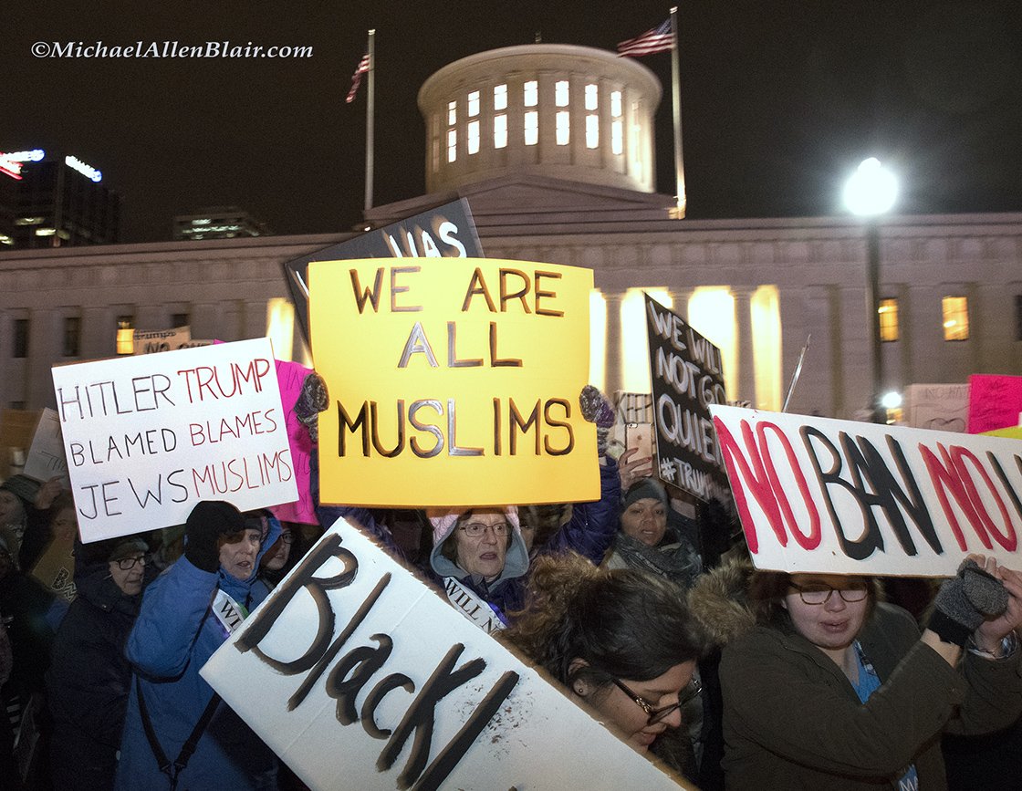 Trump protestors march in front of the State House in Columbus on Jan. 30.