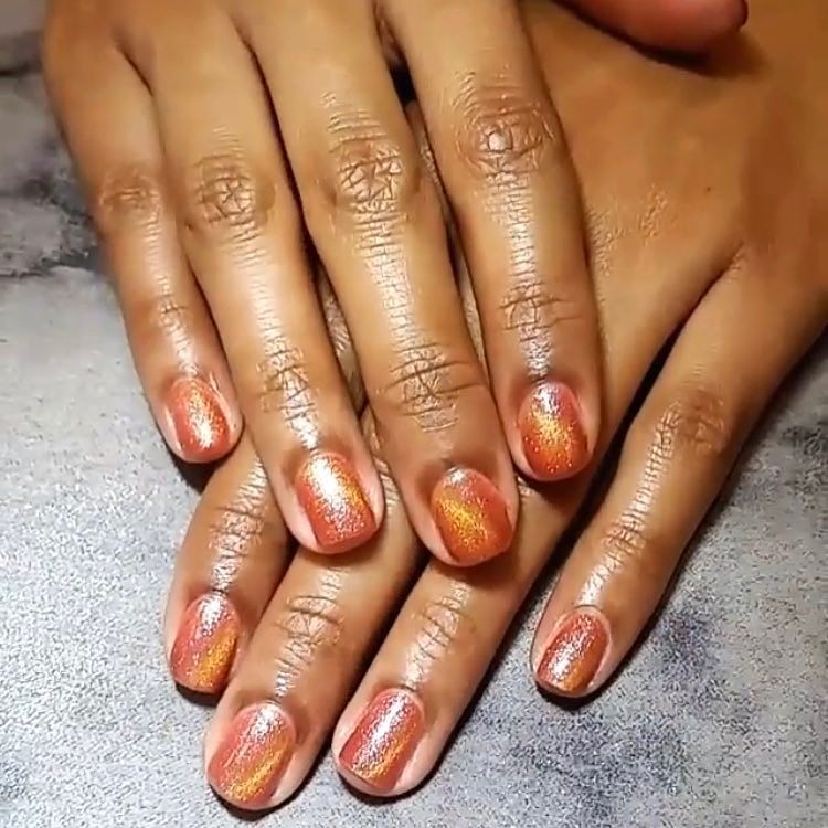 #CatEye gel mani by Adriana • #OrangeNails #GoldNails • Call and book your appt! Located i… ift.tt/2kJSZD1