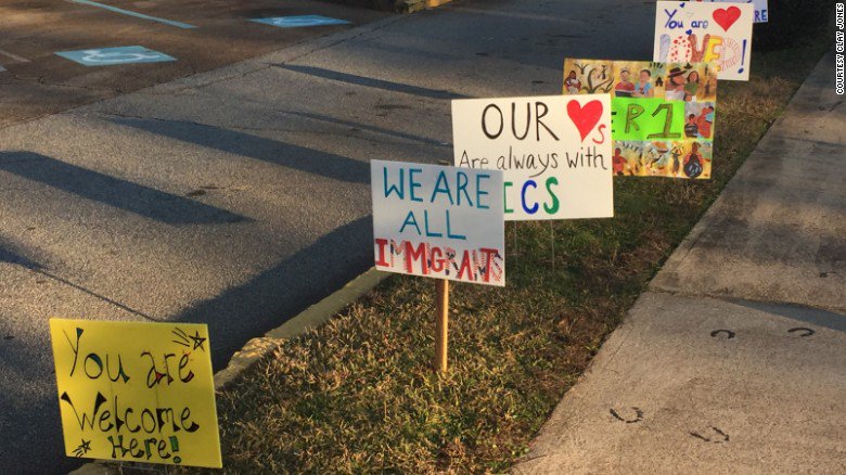 CNN's tweet photo. "You are welcome here"

"You are loved"

Refugee schoolchildren greeted with signs placed by neighbors and strangers https://t.co/bfauk1yNw8 https://t.co/Fp5OqaQk9U