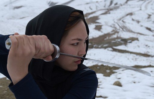 TimesNow's tweet photo. On a hilltop overlooking Kabul, Afghanistan's first female Wushu trainer, Sima Azimi, leads a group of 20 Afghan girls (Images: AFP) https://t.co/JdegRYUDLP