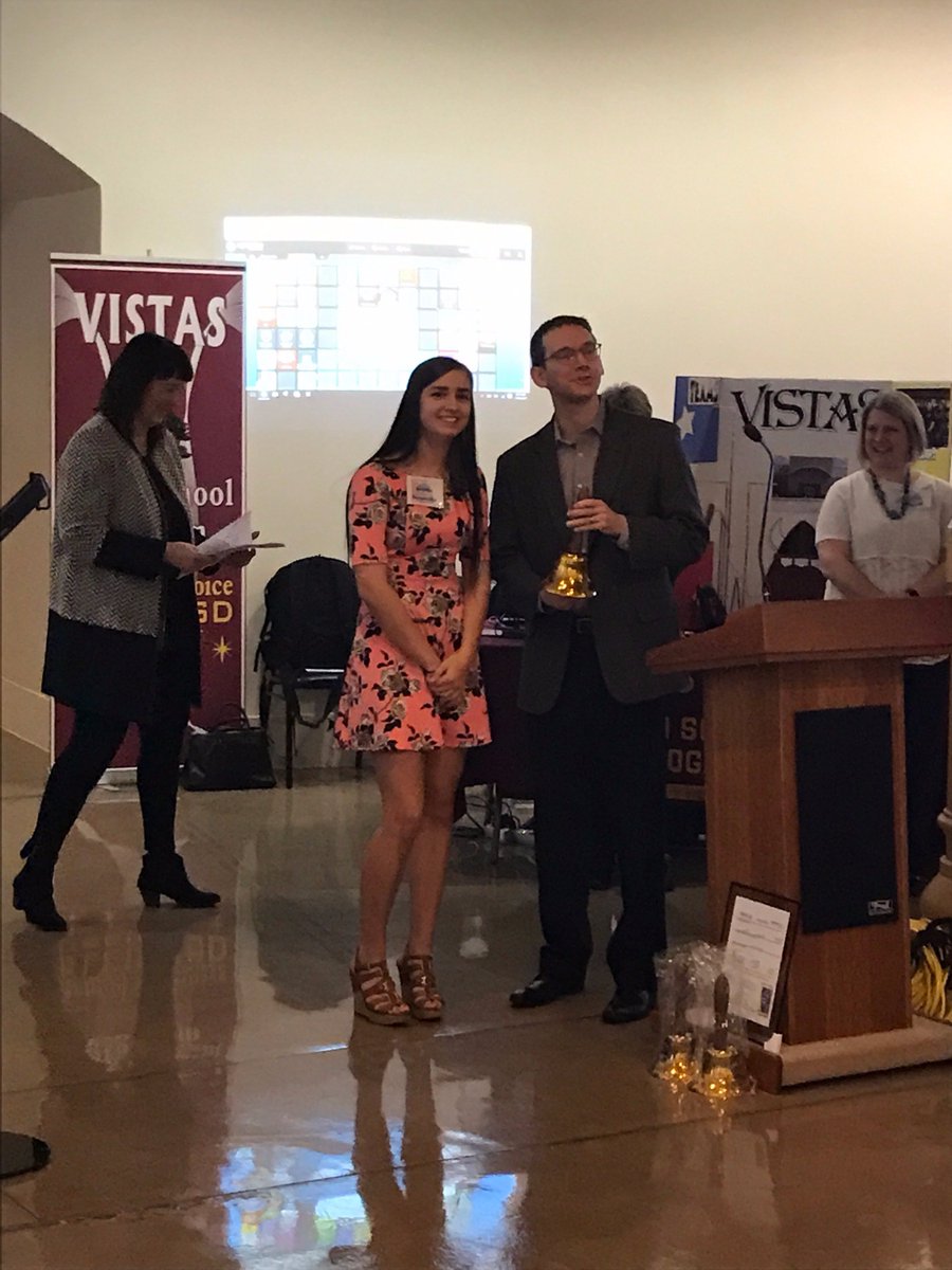 Analyn Bohensky, daughter of San Saba supt., Dr. Michael Bohensky, presents bell to Comm. Mike Morath at the TX Capitol Schoolhouse Event.