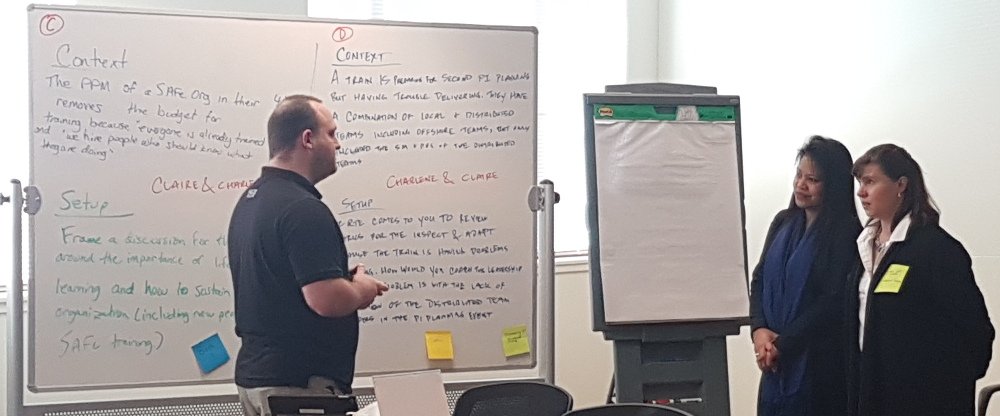 What a great first day of the SPCT candidate Immersion Week!  Josh, Charlene, and Claire take on the consulting simulation challenge.