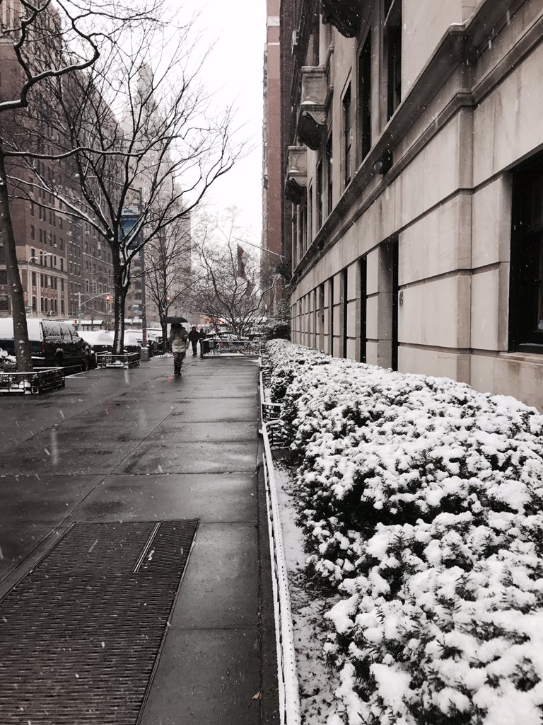 Walking through a crowd the village is aglow... #NYC #WinterInNYC
