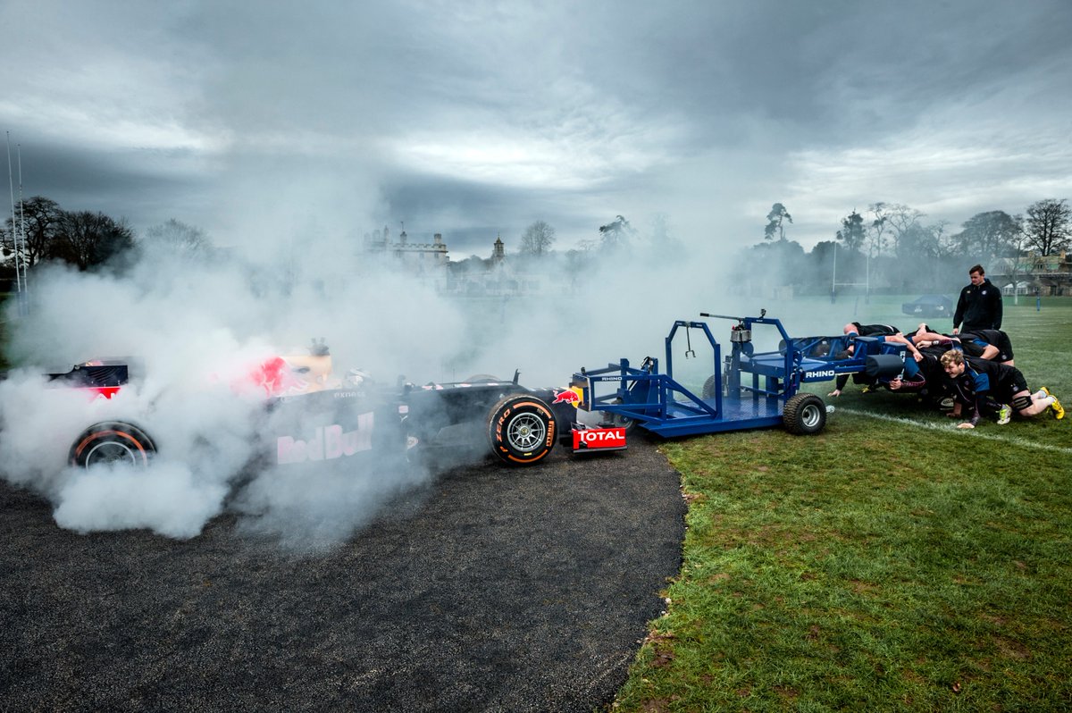 RedBullUK's tweet photo. A year ago when we put @DanielRicciardo and his 750 horsepower @RedBullRacing car up against @BathRugby's scrum π π#F1Scrum #PhotoOfTheDay https://t.co/KKm1l66Wmj