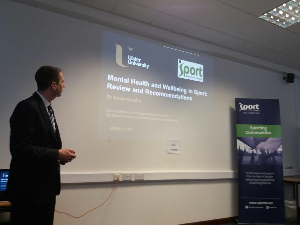 _SportNI's tweet photo. Dr Gavin Breslin (UU) presents headline findings from his Mental Health in Sport Research to SMIG members. #SportMatters #EnjoyEngageExcel https://t.co/nroDsWejIK