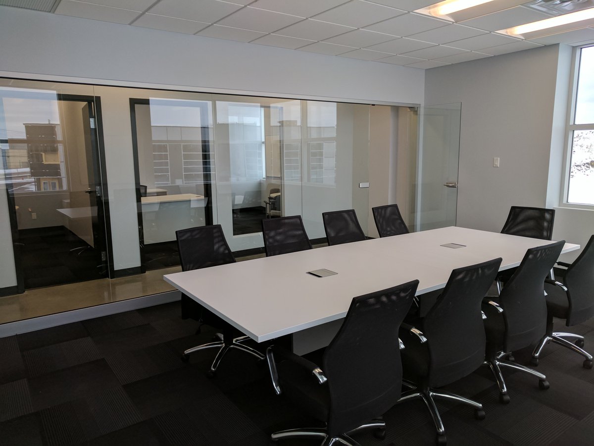 IQwareInc's tweet photo. IQware is expanding! We have moved to a new office in Laval, QC to accommodate our growing team. Here's a shot of the new conference room: https://t.co/O00aYlWo2i