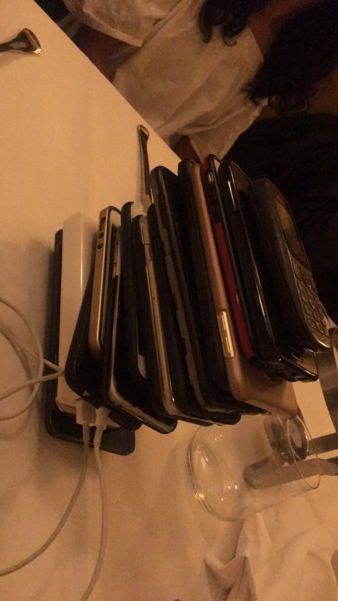 zahra_tejani's tweet photo. Phone stack at dinner!! #DelegationDinner
#ISTmun17 https://t.co/Pern99gEB9