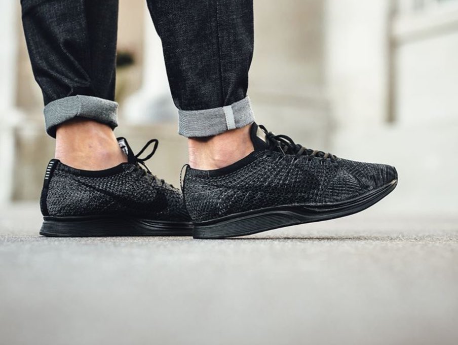 nike flyknit racer triple black uk