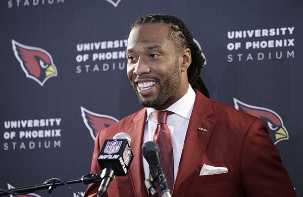 AZCardinals's tweet photo. .@LarryFitzgerald said he's playing in 2017!

READ: https://t.co/vqv7sohNe8 https://t.co/brGHPp3HvL
