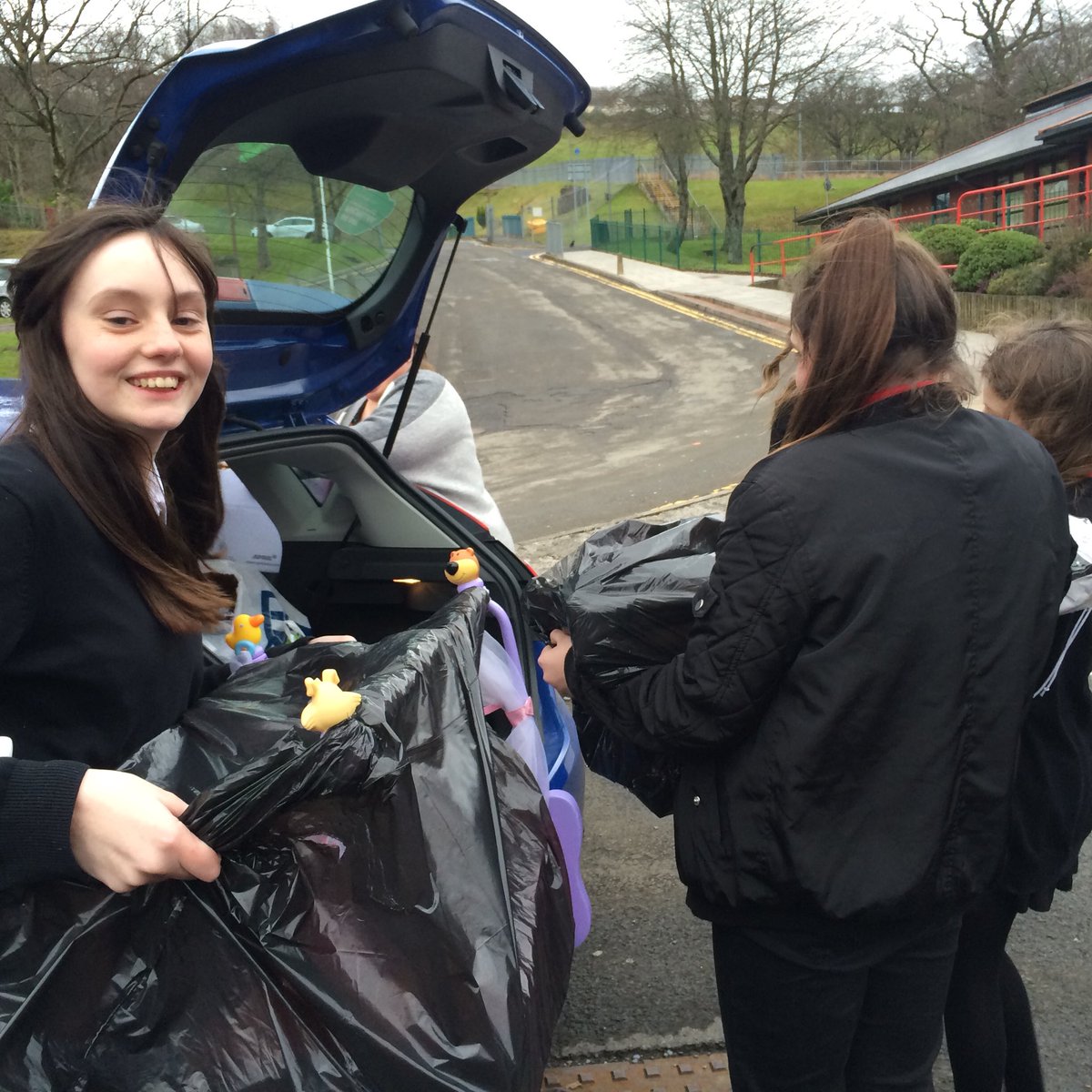 EcoSquadRCS's tweet photo. Loading up Michelle 's car ready to send the toys to the refugee children. Good to hear the toys form part of the counselling process https://t.co/3u6m5lxe6I