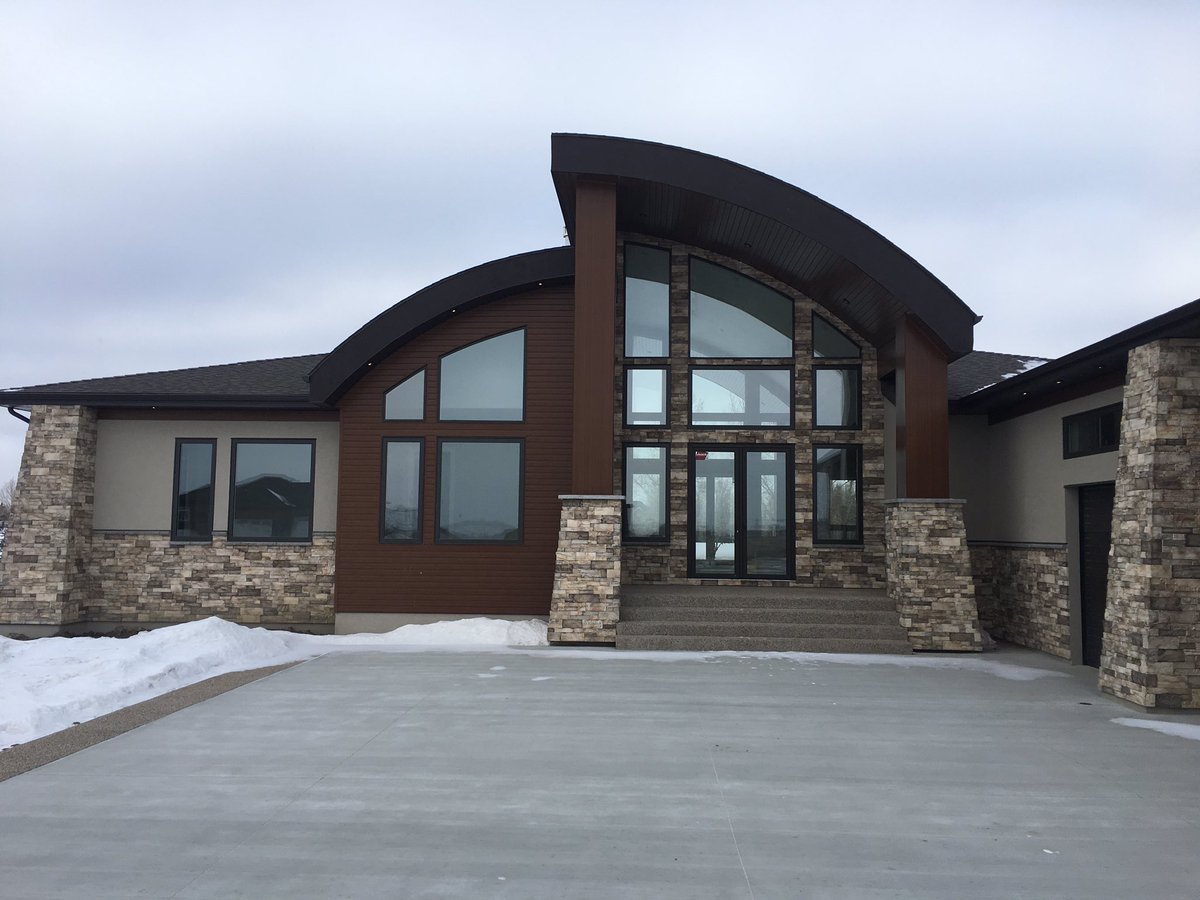 epic_sask's tweet photo. Great looking show home we just finished for @DecoraHomes. #epicexterior #luxpanel https://t.co/g8CrdjEM5y