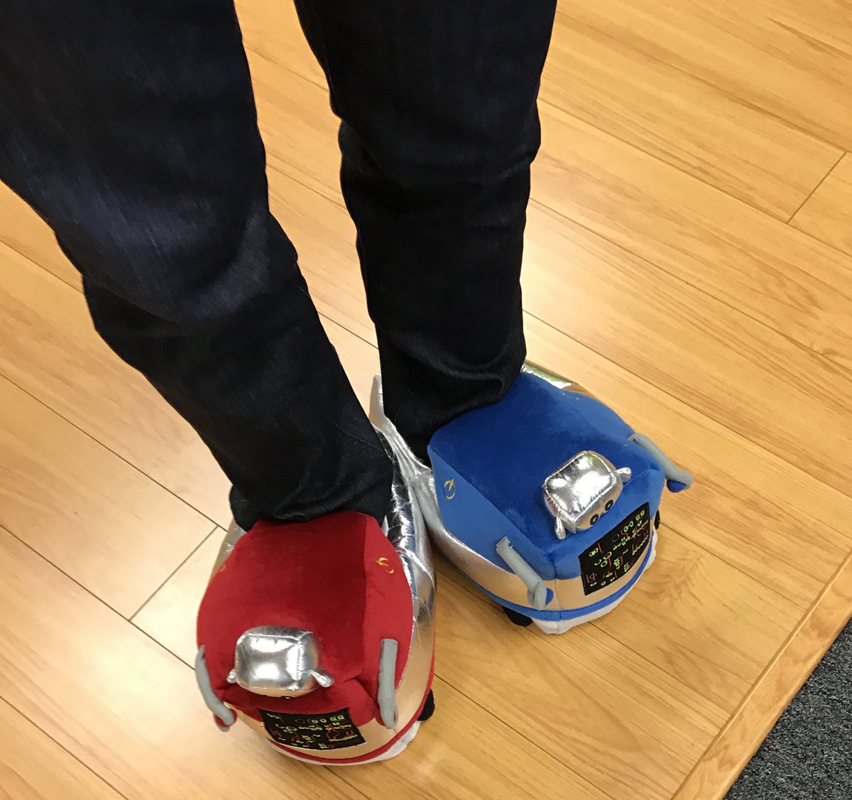 Jetlore's tweet photo. How does @elversatile approach #AI and ecommerce?  While wearing sweet robot slippers, that's how.  #jetloreculture #gobeyondpersonalization https://t.co/6761zn8wuM