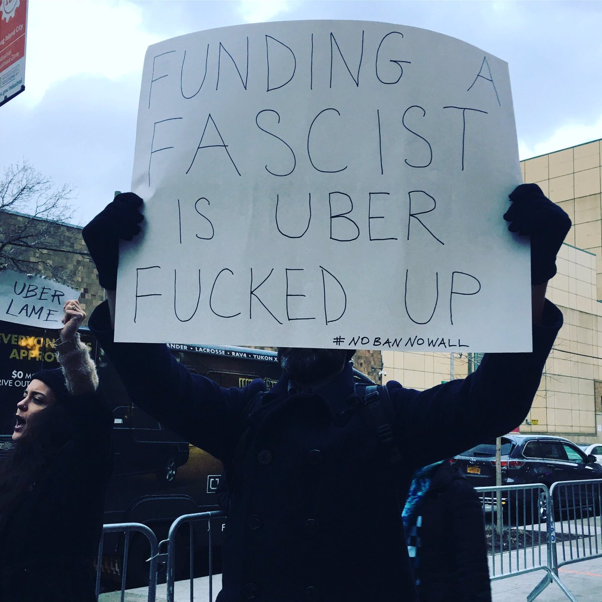 NomikiKonst's tweet image. "It's cheap for them to donate to look good! But they won't support fair wages!" #UberProtest