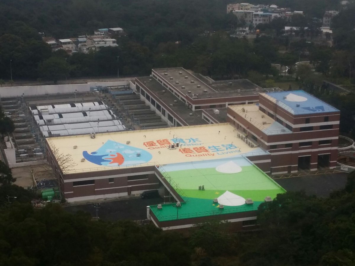 Flexcrete's tweet photo. Wow! A roof refurbishment using Flexcrete’s Roofdex system in 13 special colours to create a logo on a Water Treatment Works in Hong Kong https://t.co/QpxSXAMYsc