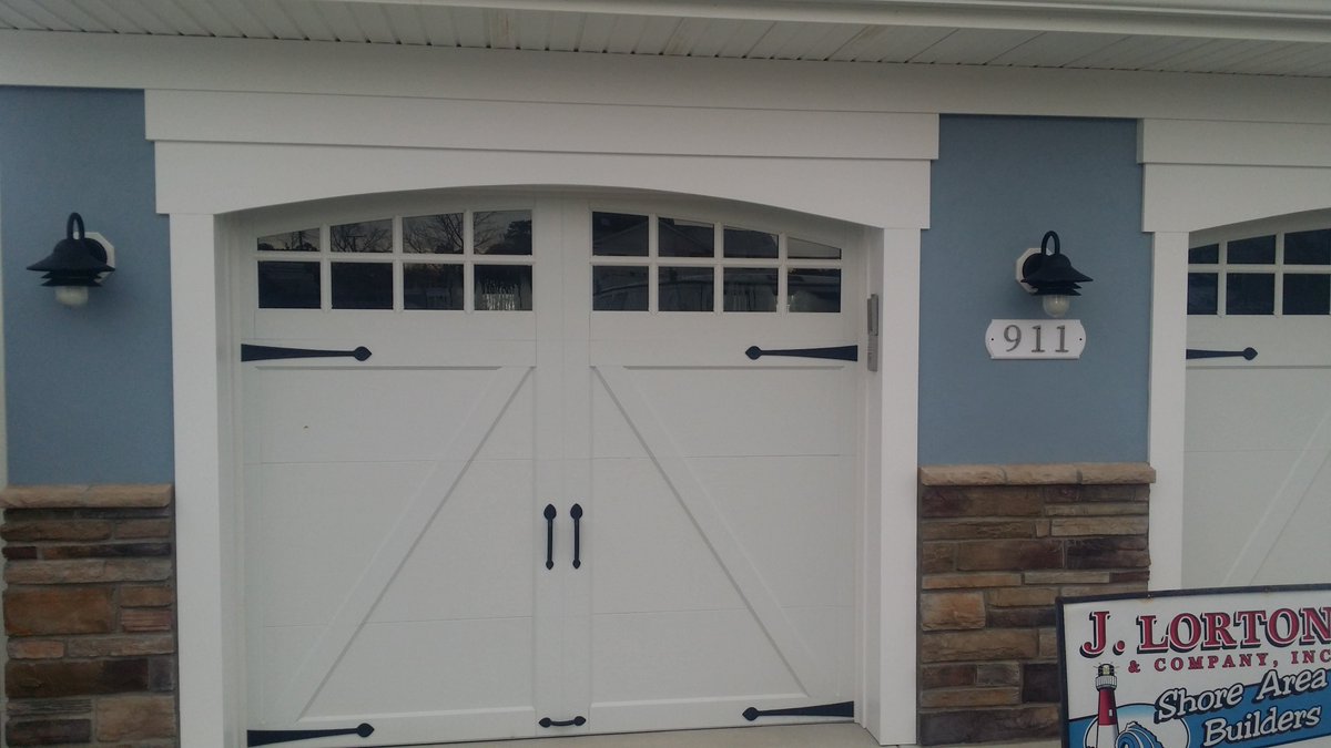 LortonCo's tweet photo. Trying to add curb appeal to your existing home?  Carriage style garage doors, composite arch top and cultured stone will do the trick!!! https://t.co/1QNzGbuwoF