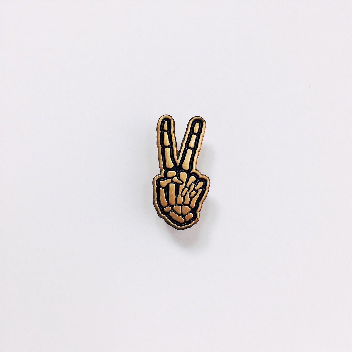 workerman's tweet image. NEW! Skele-peace enamel pins in the shop NOW!