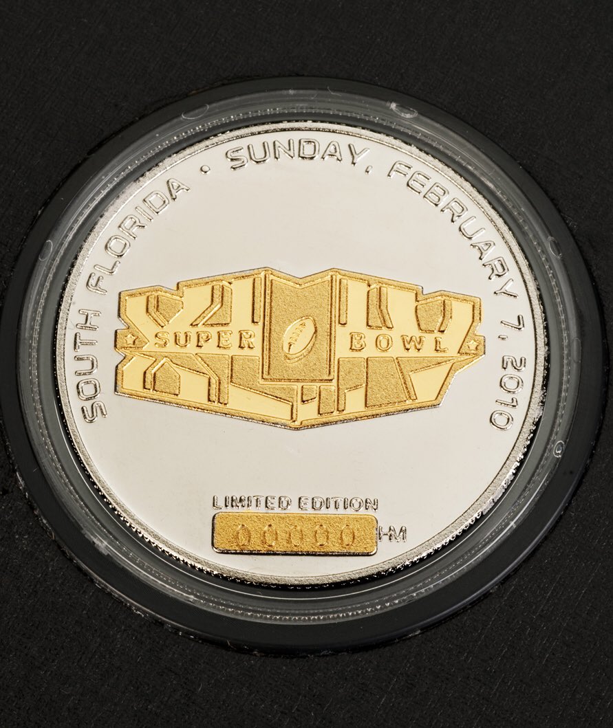 NASAglenn's tweet photo. Almost time for #SB51 and look what we found- throwback photos of STS-129 crew @ProFootballHOF with SB44 official coin flown in space! #fbf https://t.co/0gPQeeoMMg