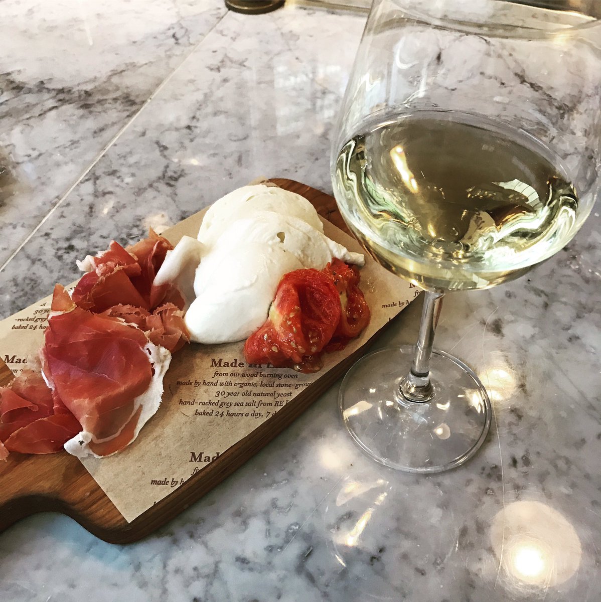 Bastianich "Vini Orsone" Friuliano with mozzarella, roasted tomatoes, and prosciutto
