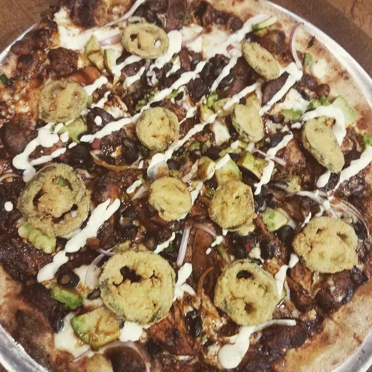 Holy Oaxaca Mole with fried jalapeño and smoked chicken thighs @SliceBirmingham