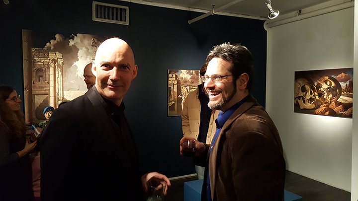 voegeleuniverse's tweet photo. @wellingtonart John Wellington surrounded by his incredible paintings. TEMPLE TOMB FORTRESS RUIN on view at @TheLodgeGallery through March 5 https://t.co/rqEY8RzBwz