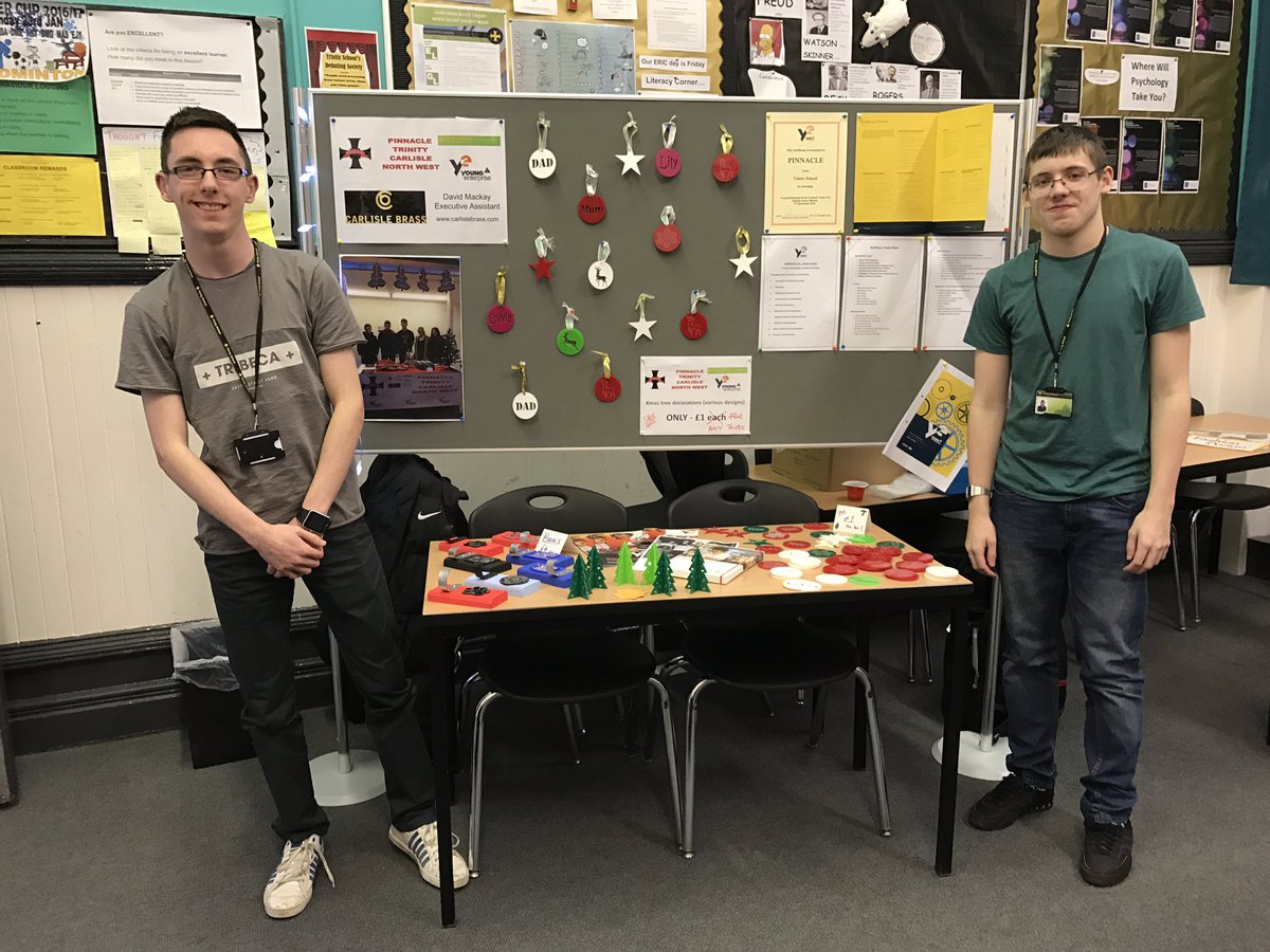 TrinityPinnacle's tweet image. Pinnacle members Lewis &amp;amp; Marc displaying their company's products at the recent @Trinity6Form Open Evening @TrinSchCarlisle #YoungEnterprise