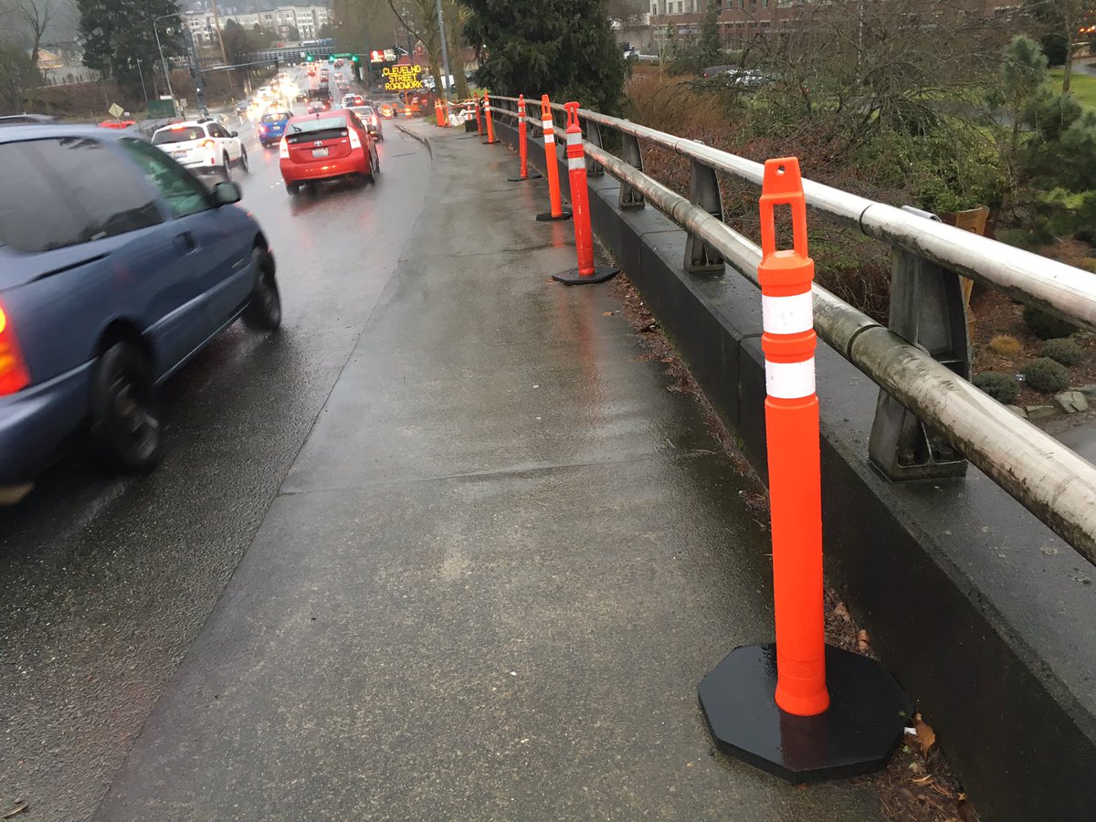 hackeryhack's tweet image. Hey, @CityOfRedmond, I walk on Redmond Way bridge every day and it's super dangerous because of these cones. They must be removed.